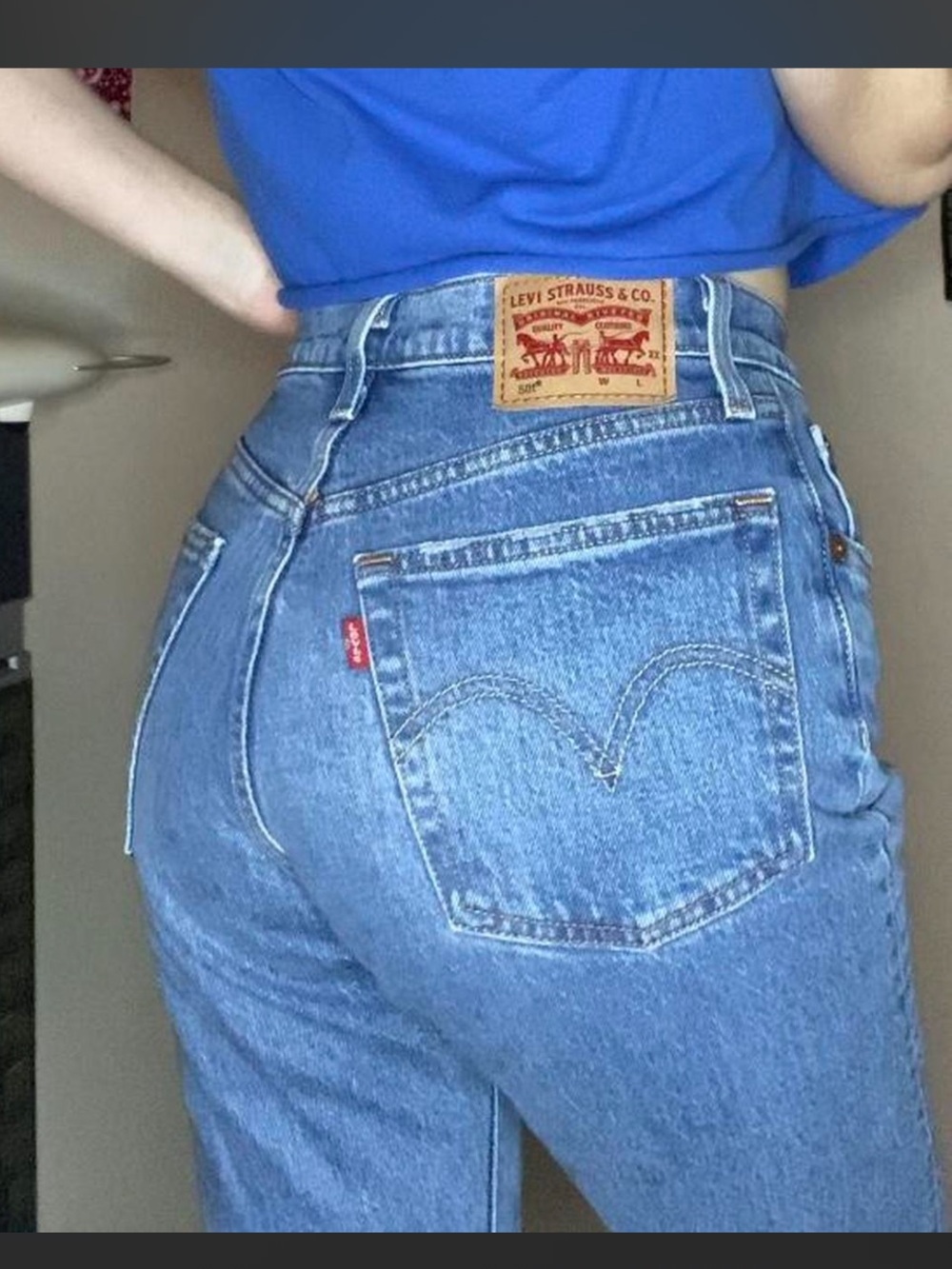 Levi's High-Rise Light Blue Mom Jeans with Red Tab